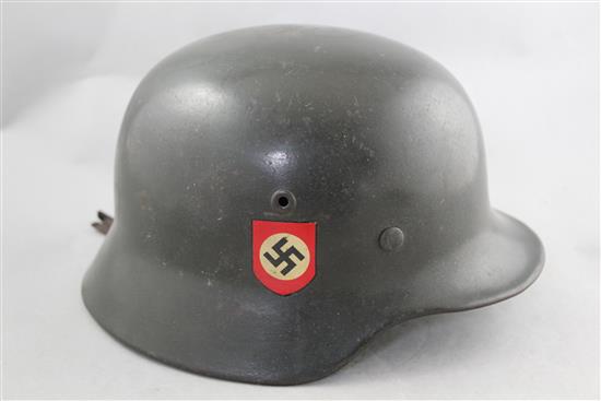 A German Third Reich M40 combat police helmet,